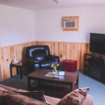 Photo of the living room inside the deluxe cottage.